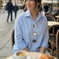Oversized damesblouse met opvallende knopen