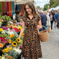 👗 Elegante damesjurk met revers en luipaardprint