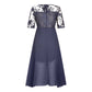 Elegante, zwierige cocktailjurk met borduursels